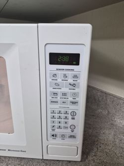 White general Electric microwave works great only $45 dolaritos