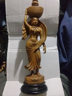 Would carbon off of Indian woman carrying a basket height 16 inch