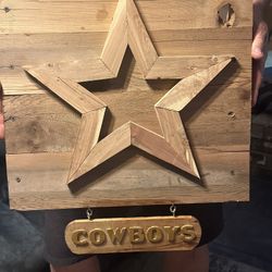 Wood cowboys sign with star