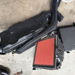 Toyota Camry 2022 stock air intake assembly.