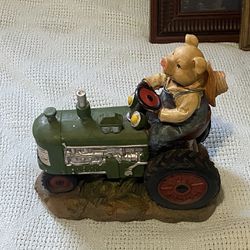 Vintage Resin Pig Farmer W/ Hat On Green Tractor