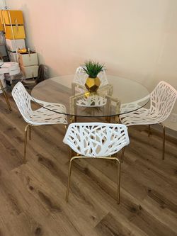 Contemporary Glass Dining Table with Velvet Chairs