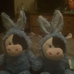 A stuff animal a rabbit cow