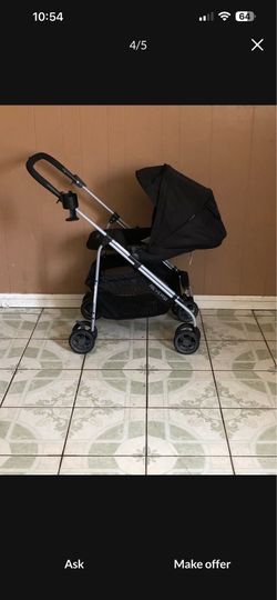 PRACTICALLY NEW EVENFLO REVERSI STROLLER AND BASSINET!!!!