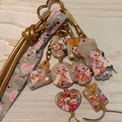 SPACE MOLLY GOLD KEYCHAIN