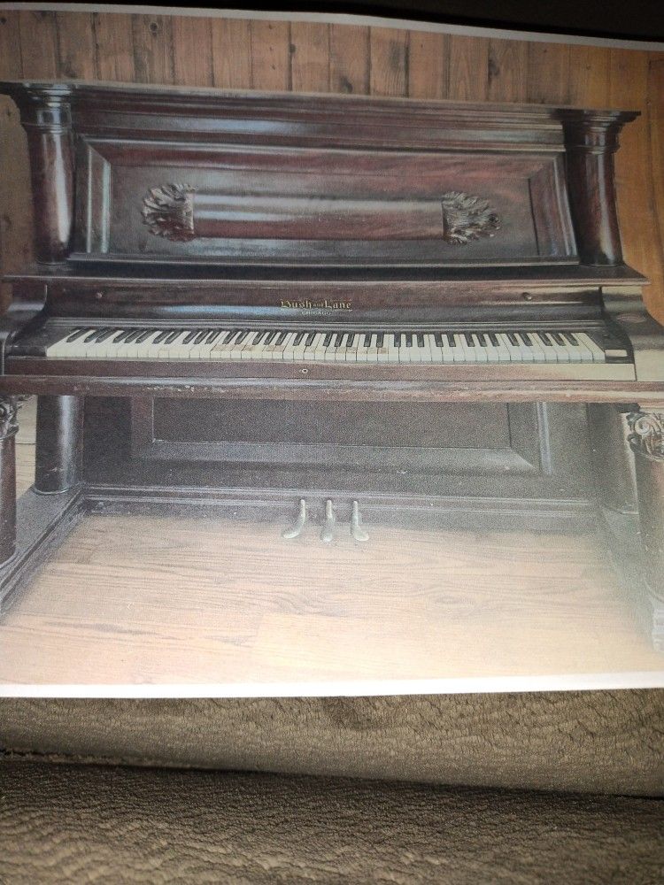 For Sell,As Is. Bush& Lane Upright Piano In Walnut Empire Revival Cabinet Made In 1904.Needs Restoring . Only Serious Inquiries 