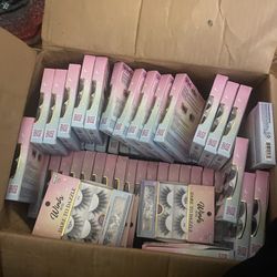 This is a Salon Perfect Vivid-HD 635 lash and dual-ended 2-in-1 liquid liner and lash adhesive in black and blue.    