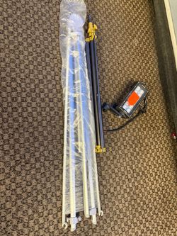 Two camera tripods-truck light-and an stage/work light