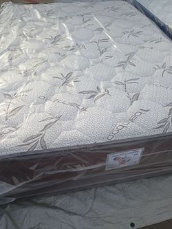 Brand new queen size pillowtop mattress and box spring free delivery depends on location