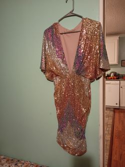 Beautiful rainbow color changing dress changes in the light