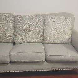 Traditional Beige Sofa with Nailhead Trim & Patterned Cushions