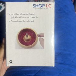 Bead spinner bead stringing tool