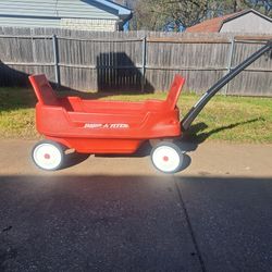 Radio Flyer-- Red Wagon (Model #2700) with 4 cup holder, 2 seat belts, and 2 foldable backrests.