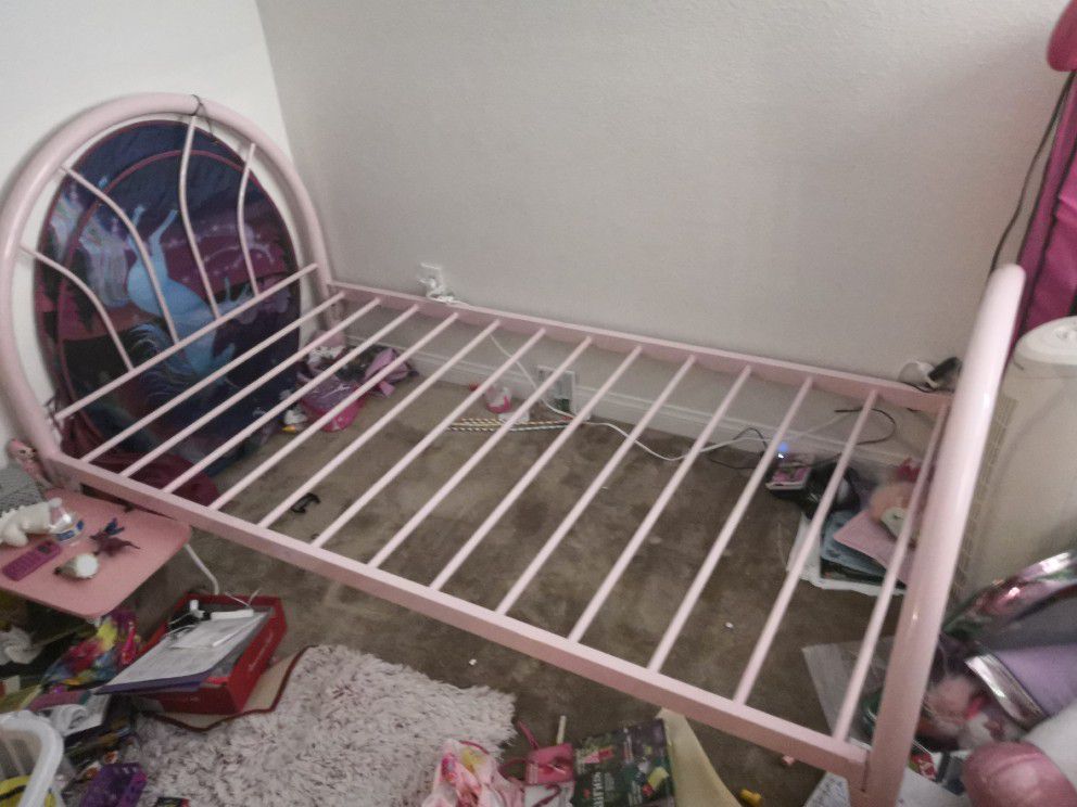 Twin size pink metal bed frame