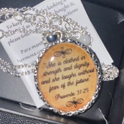 Avon gift necklace (she is clothed in strength verse)