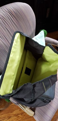 Black backpack bright green interior