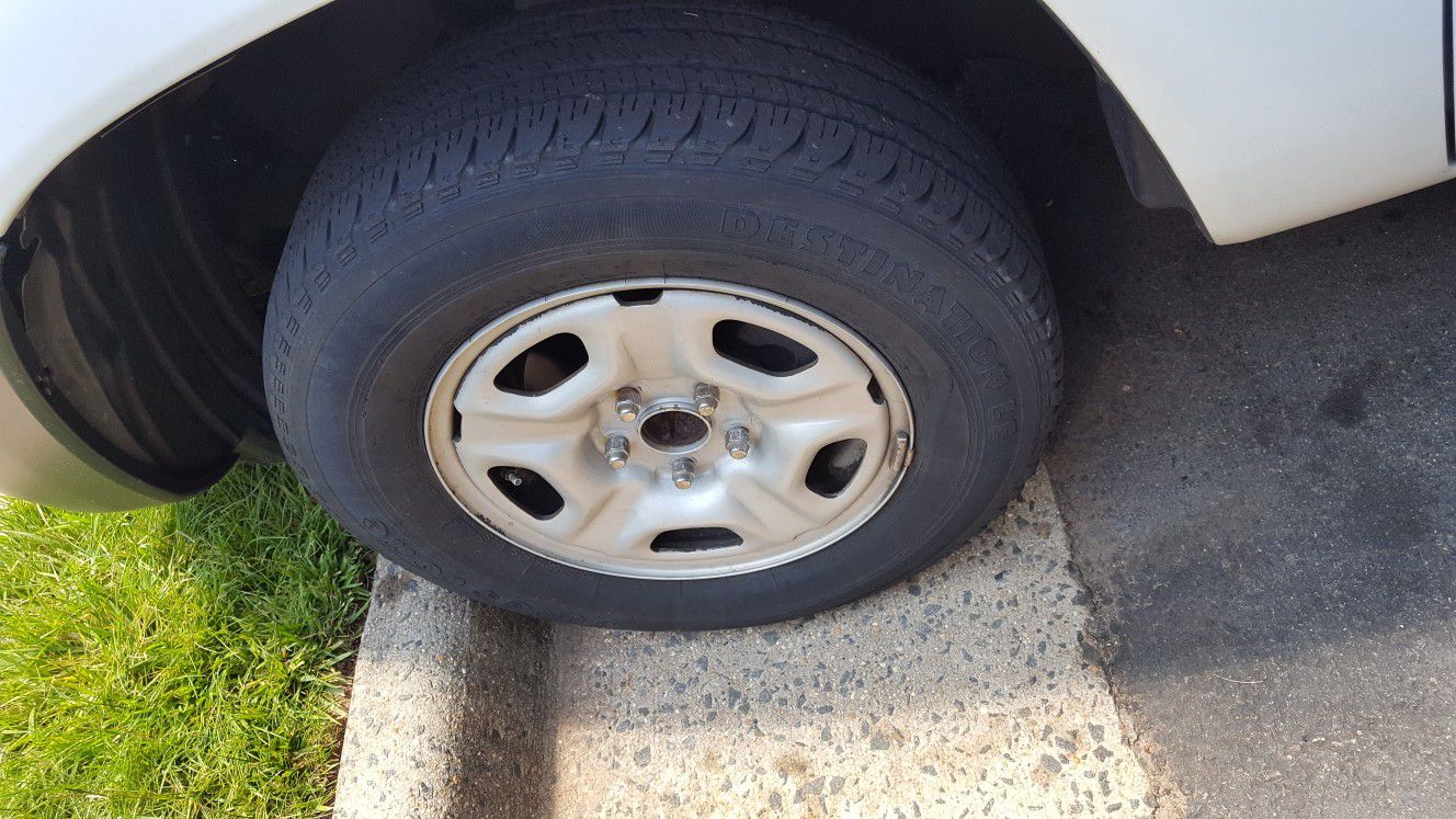 09 Toyota tacoma steel wheels and tires 3 tires good condition