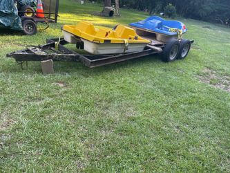 Trailer and (2)  paddle boats