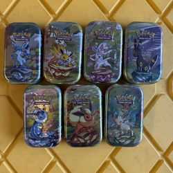Pokemon TCG Prismatic Evolution Mini Tins