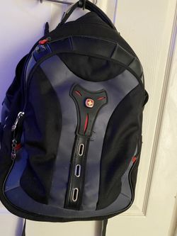 Swiss Gear Black & Red Backpack With Lots Of Compartments 