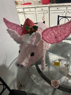 Christmas yard light pigs