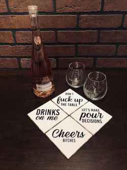 Set of 4 ceramic coasters. Perfect gift item. $15 (wine and glasses not included)