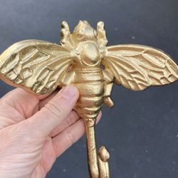 RAre gold cast iron bee hook 