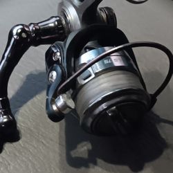 LEW'S  LS 15 SPINNING REEL