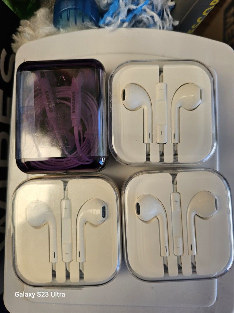 Apple And Samsung Earphones. New