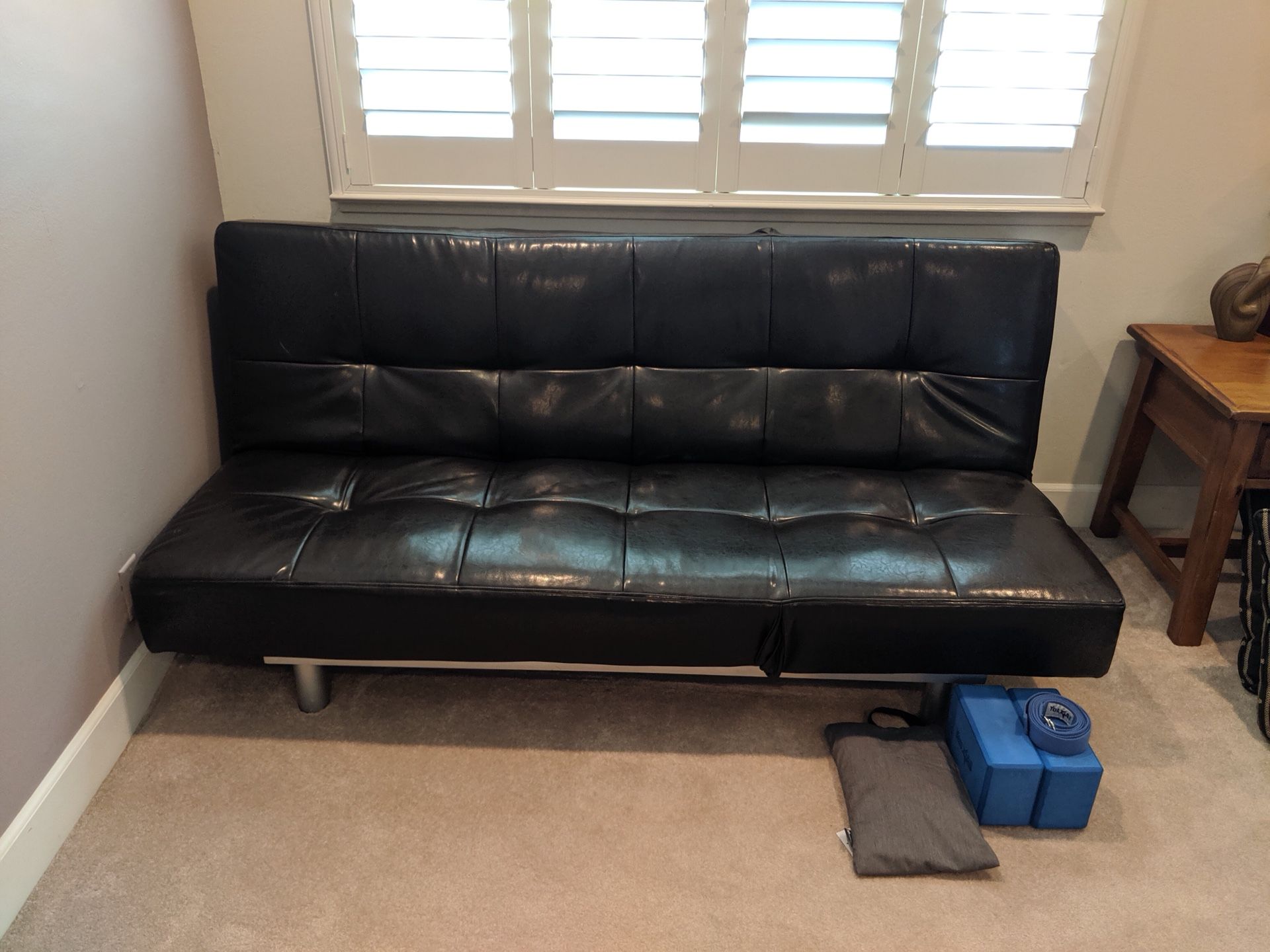 Futon- used only twice- brand new condition