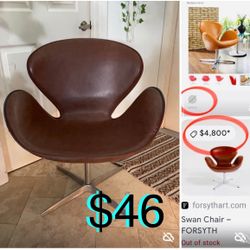 $46 LumiSource Accent Swivel chair Mid century style swan chair Replica Faux leather some scratches