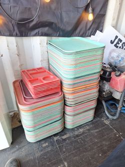 Around 150 comercial food trays