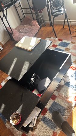 Center table for living room. Extra space as top lifts off to reveal.