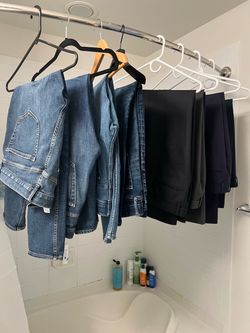 4 Men’s business attire pants and 4 pairs of jeans- whole bundle size M