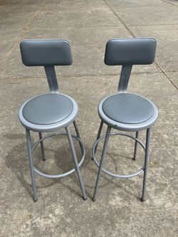 Two padded stools
