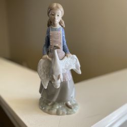 Woman Holding Goose