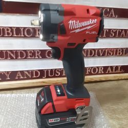 NEW MILWAUKEE M18 FUEL 3/8 IMPACT WRENCH AND 5.0 BATTERY 