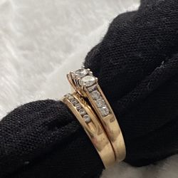 14k gold diamond ring set in perfect condition size 8 1/2 yes, it still  available