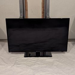 Element Television - old but works.  Remote included.