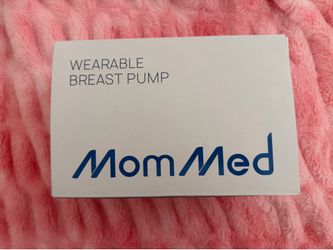 Wearable breast pumps