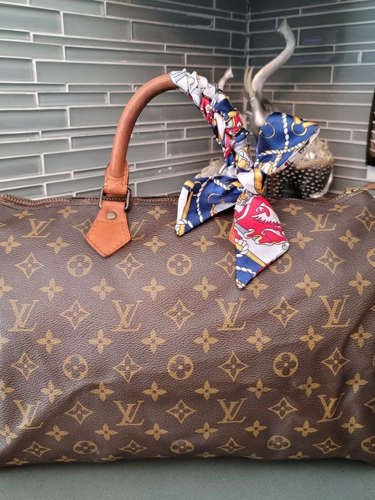Louis Vuitton Speedy 35 handbag(Gold)