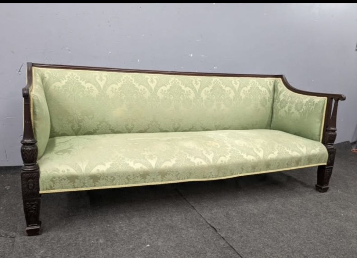 Antique Chippendale style mahogany framed upholstered sofa; 75" wide