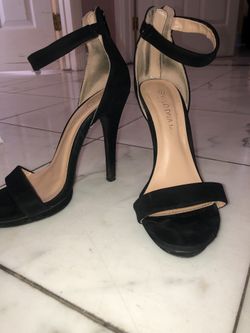 Black heels size: 7