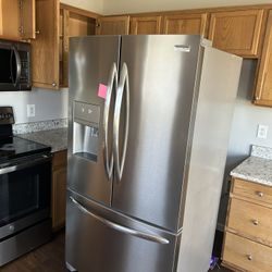 Whirlpool Stainless Steel Double Doors And Fridge At The Bottom 