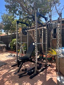 OLYMPIC SQUAT RACK POWER CAGE WITH OLYMPIC WEIGHTS AND BENCH