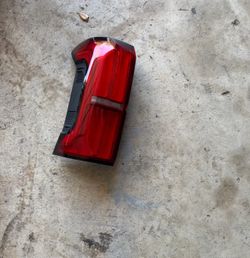 2024 -2025 Toyota Tacoma tail light driver side Oem has small chip