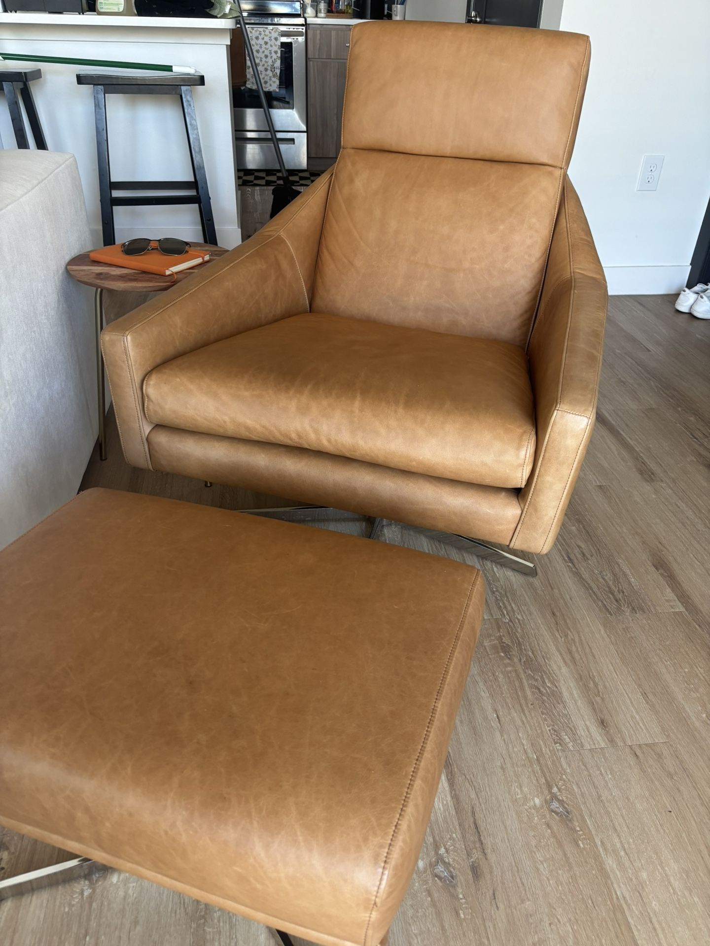 Brown leather West Elm Chair And Ottoman