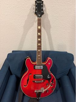 Vintage red Epiphone EA-250 hollow body electric guitar