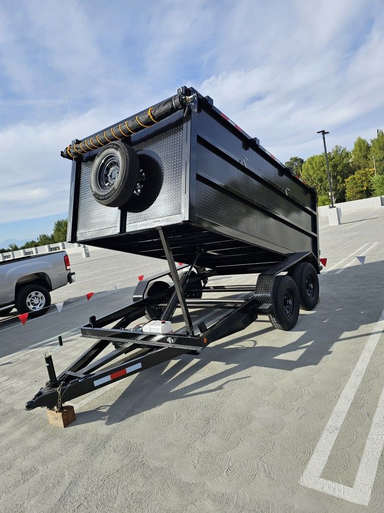 NEW DUMP TRAILER 8X12X4 12000 LBS
ROLLING TARP--SPARE TIRE,ELECTRIC BRAKES,HYDRAULIC SYSTEM,REMOTE CONTROL,IDEAL FOR HAULING, DEMOLITION, TRASH ETC,