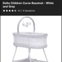 Delta Children’s Curve Bassinet 
